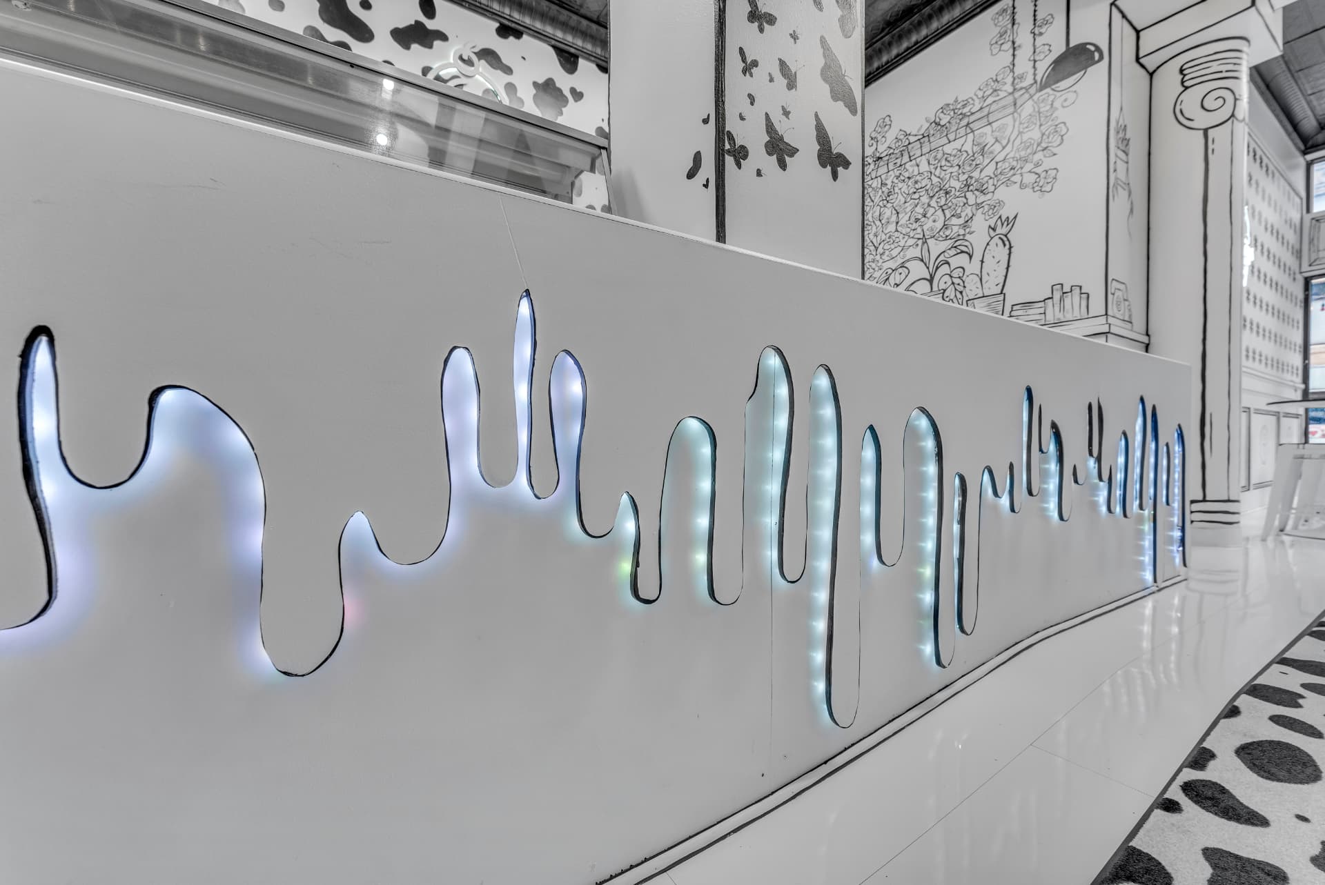 Close-up of the counter's glowing ice cream drip lighting
