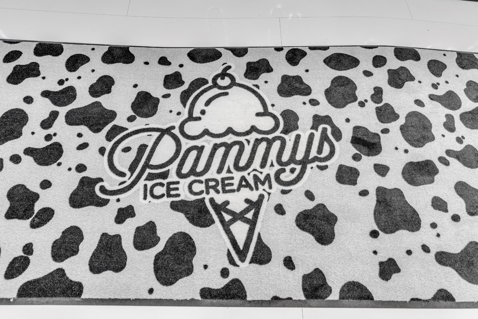 Cow-print Pammy's Ice Cream floor runner